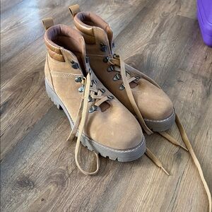 Oker brown ankle boots new never worn. Has a few marks from “shelf wear”